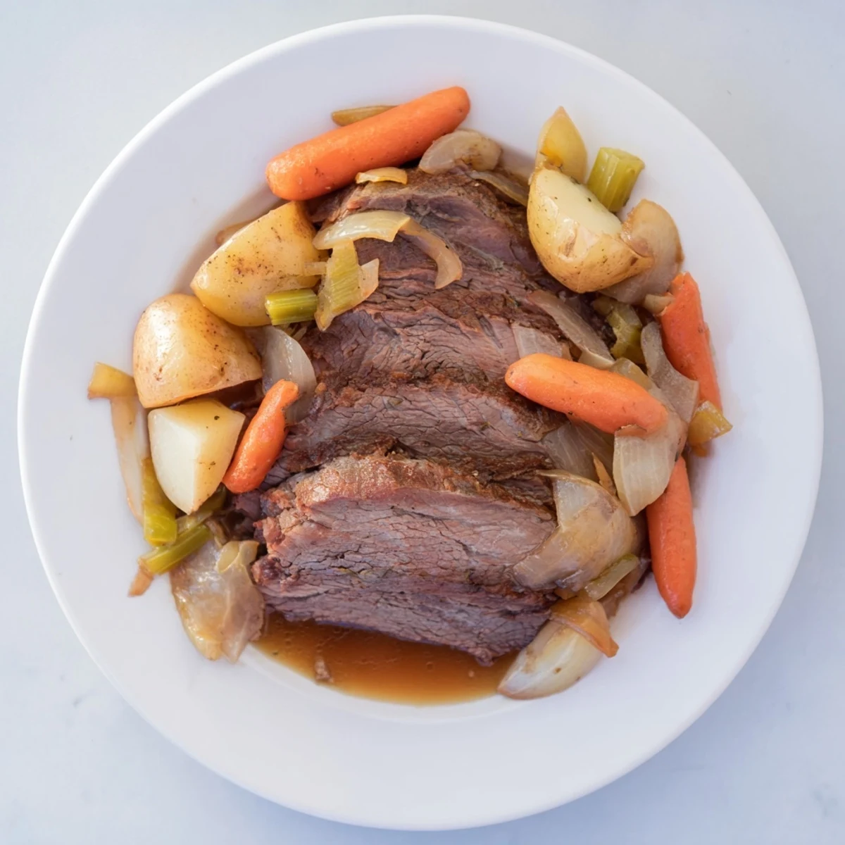 Close-up of a flavorful Pickle Brine Pot Roast, showcasing the fall-apart meat and hearty vegetables.