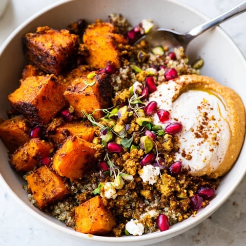 Warm spiced winter bowls filled with roasted veggies, ube-coconut purée, and toppings. 