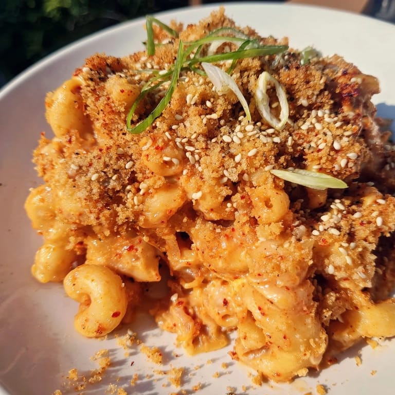Delicious Spicy Kimchi Mac & Cheese, perfect for a cozy family dinner night.