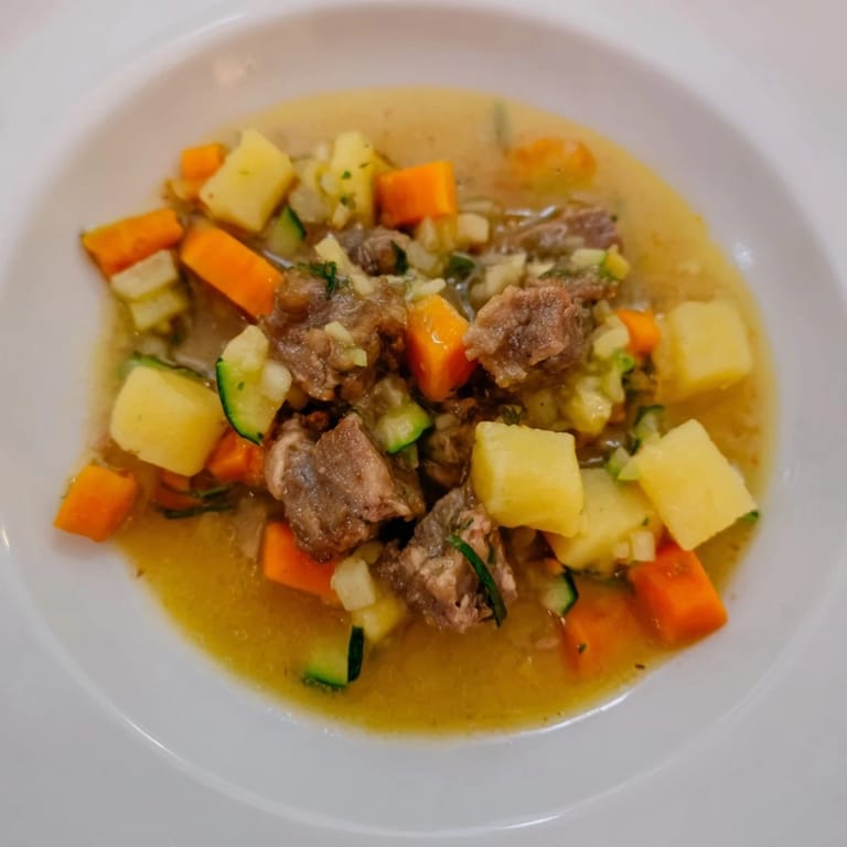 Flavorful Sweet Lamb Platter for Baby: a beautiful medley of tender lamb, carrots, and sweet potato with broth.