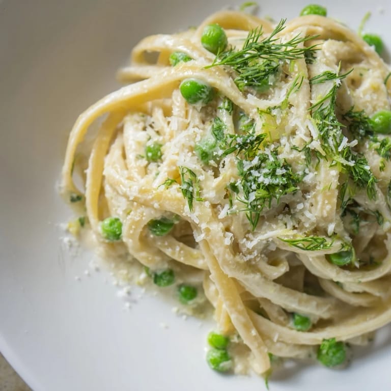 Bright, flavorful Creamy Dill Pasta ready to be enjoyed with the zest of lemon shining through.