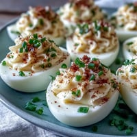 Everything Bagel Deviled Eggs with creamy filling and savory topping.